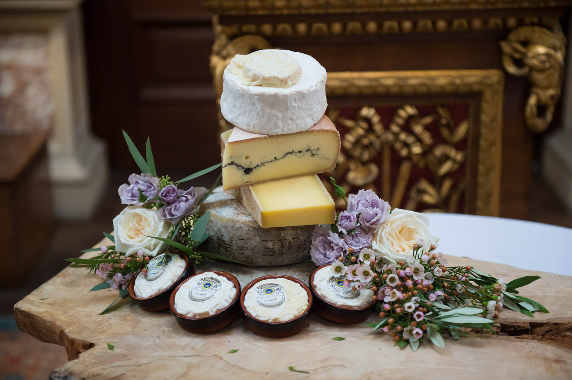 A selection of cheeses stacked on top of each other by Cheesee Peasee